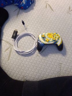 Pikachu Nintendo Switch Pro Controller And Switch Power Dock.