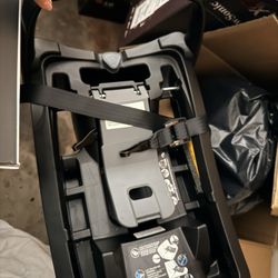 Brown Baby Carseat With The Base Evenflo