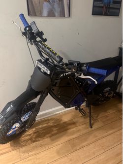 Blue and black electric dirt bike