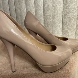 Womans 9 1/2 Platform Heel/Pump. Nude.