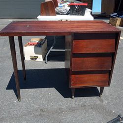 Wooden Desk With Three Drawers