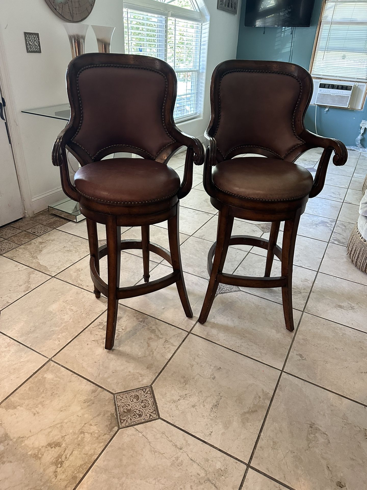 2 high Chairs $90 each 