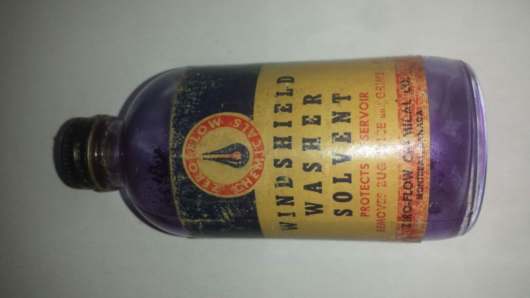 Antique windshield washer solvent bottle