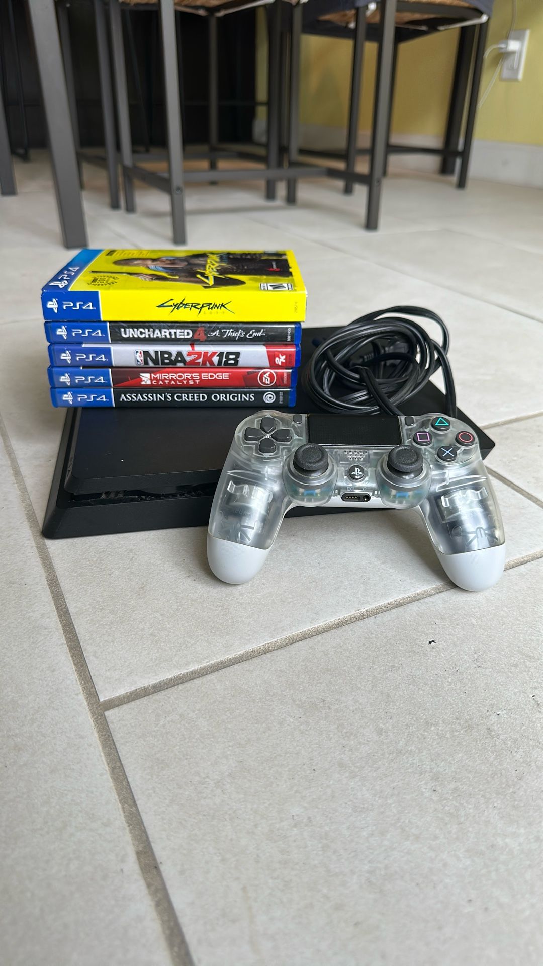 PS4 SLIM with controller and games
