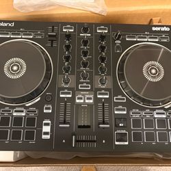 Roland DJ - 202 DJ controller, with new case.