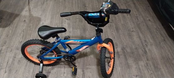 BICICLETA PARA NIÑO LA RUEDA ES 16"