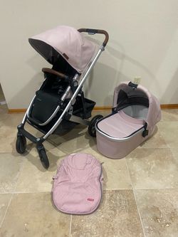 Uppababy Cruz V2 Stroller with Bassinet and Cozy Ganoosh Pink