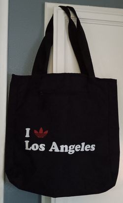 Adidas Black Tote Bag With Outside Zipper Compartment And Inside Pocket.