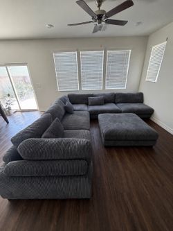 Beautiful dark gray sectional couch