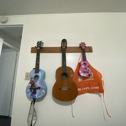 2 Guitars And Ukulele 