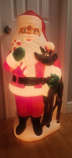 Vintage Christmas blow mold. Santa Claus holding reindeer and candy cane. 40"