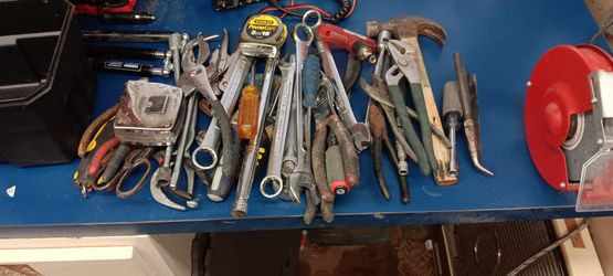 A lot of different tools from crescent wrenches device screwdriver and other type of tools