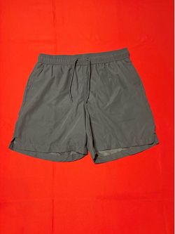 Grey swim shorts with drawstring waist and pockets size M