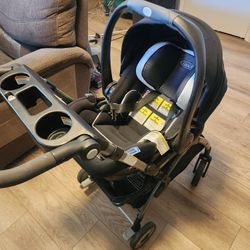 Graco Snugride 35 DLX Car Seat With Stroller Attachment