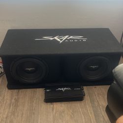 Two 12in Subs From Skar Audio With Amp
