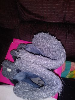 Winter thigh high boots , with fur on the inside.