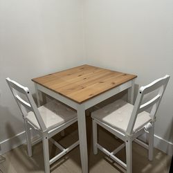 IKEA table with two chairs
