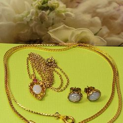 #2143, GOLD PLATED LOT, OPAL , GARNET, SAPPHIRE, 2 NECKLACES, EARRINGS.
