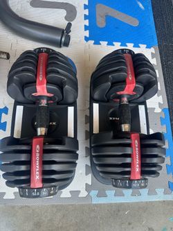 Pair bowlflex dumbbells 5-52.5lbs like new