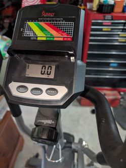 Compact elliptical stepper machine