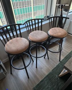 3 Swivel bar stools
