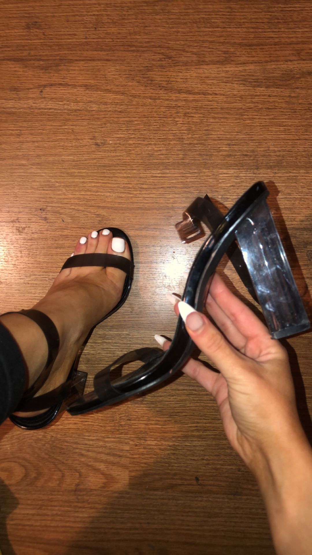 Clear black strapped heels