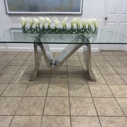 Glass Dining Table with Orchid Center Piece