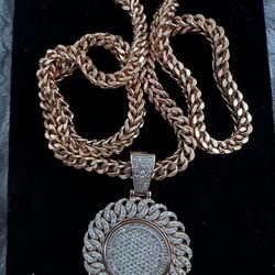 10k Franco chain and 10k gold 4k diamond charm