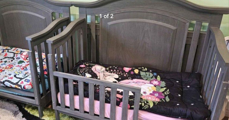 Oxford Baby London Lane crib with the toddler conversion guard rail.