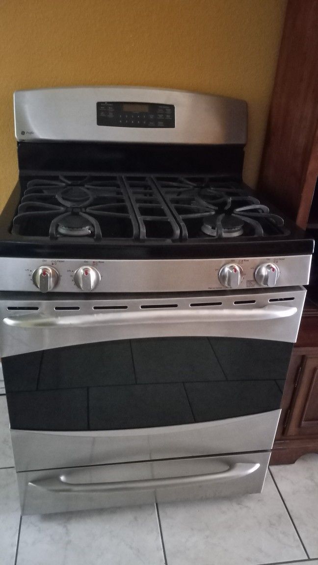 ESTUFA STAINLESS STEEL DE GAS TODO FUNCIONA BIEN