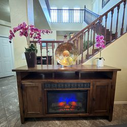 Beautiful rustic fireplace /tv stand in excellent condition 5 colors of flames