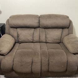 Brown love seat couch