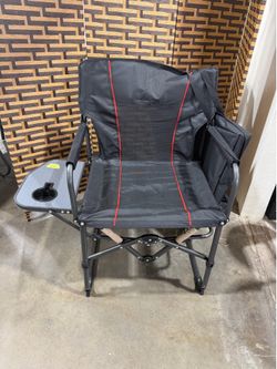 Folding camping chair with side table