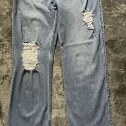 Distressed blue jeans