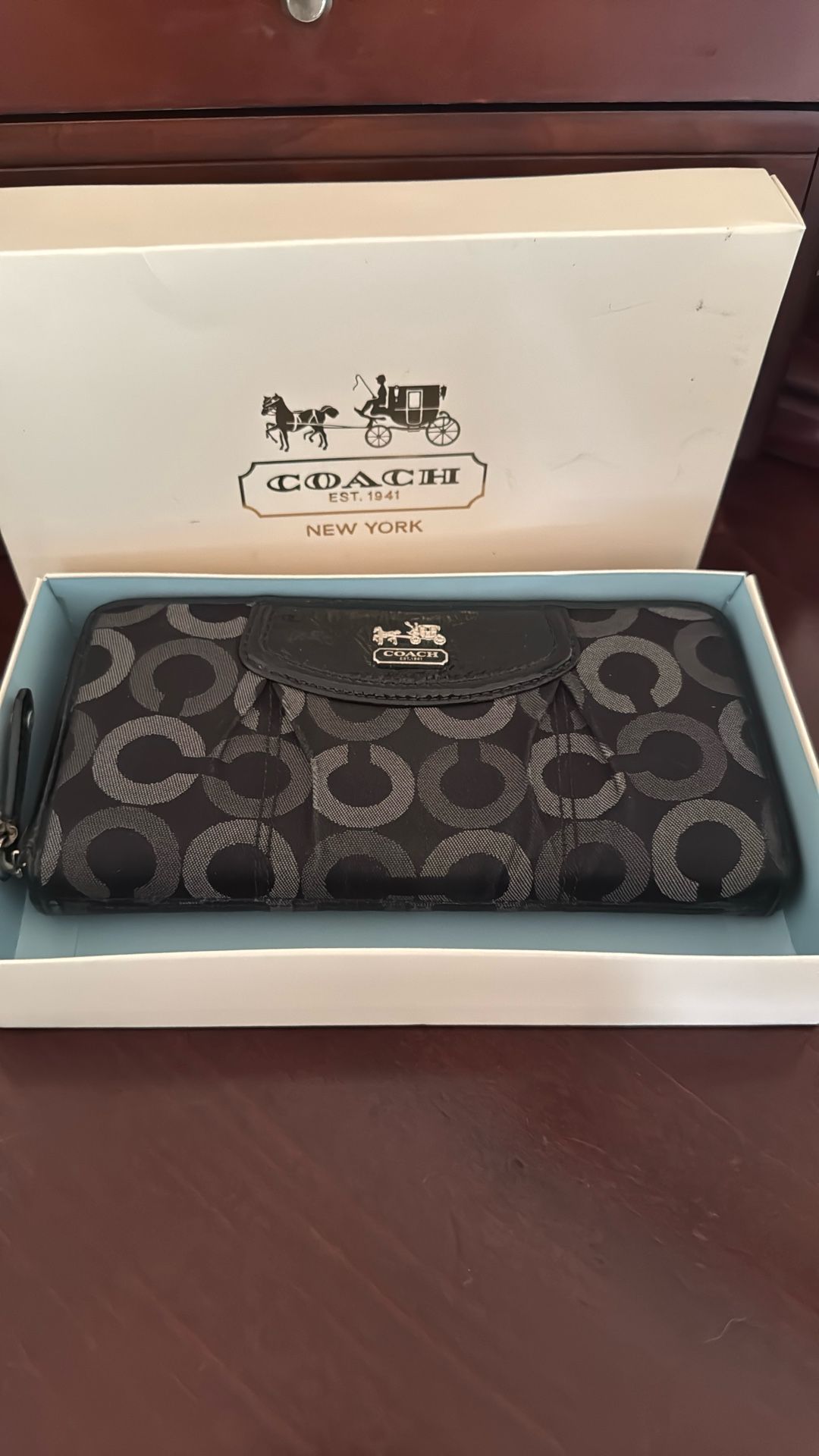 Cartera Coach.