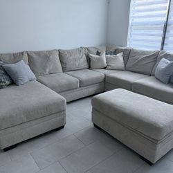 Sectional With Storage Ottoman