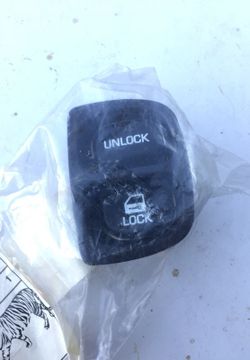 Saturn right door lock switch