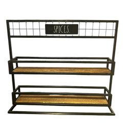 Two-tier metal spice rack with wooden shelves.