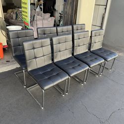 8 of Signature Design by Ashley Madanere Contemporary Faux Leather Upholstered Dining Chair