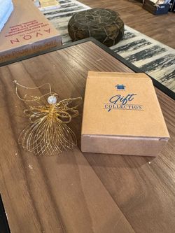 NIB Lot of 11 vintage 1997 Avon, radiant angel ornament
