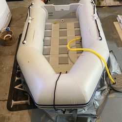 Inflatable dinghy + Outboard 