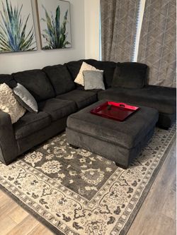 Ashley’s Mapfield Sectional, Ottoman, Rug