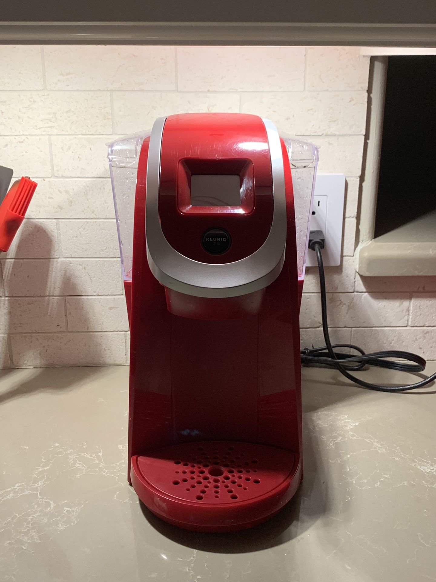 Gently and minimally used Keurig 2.0 Red coffee maker. Pristine condition!