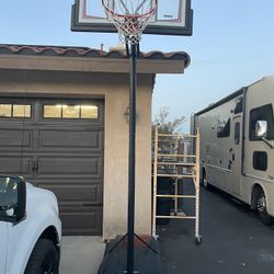 Outside basketball hoop like new portable