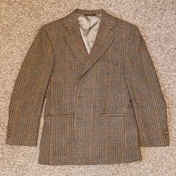 Brown wool suit jacket in Great Condition. Clean and ready to use.
