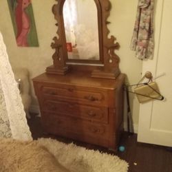Hand Carved Antique Dresser With Swivel Mirror