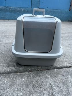 Arenero para gatos