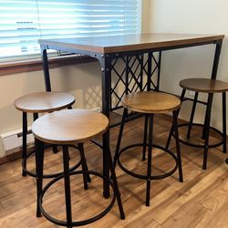 Bar-height table and 4 stools