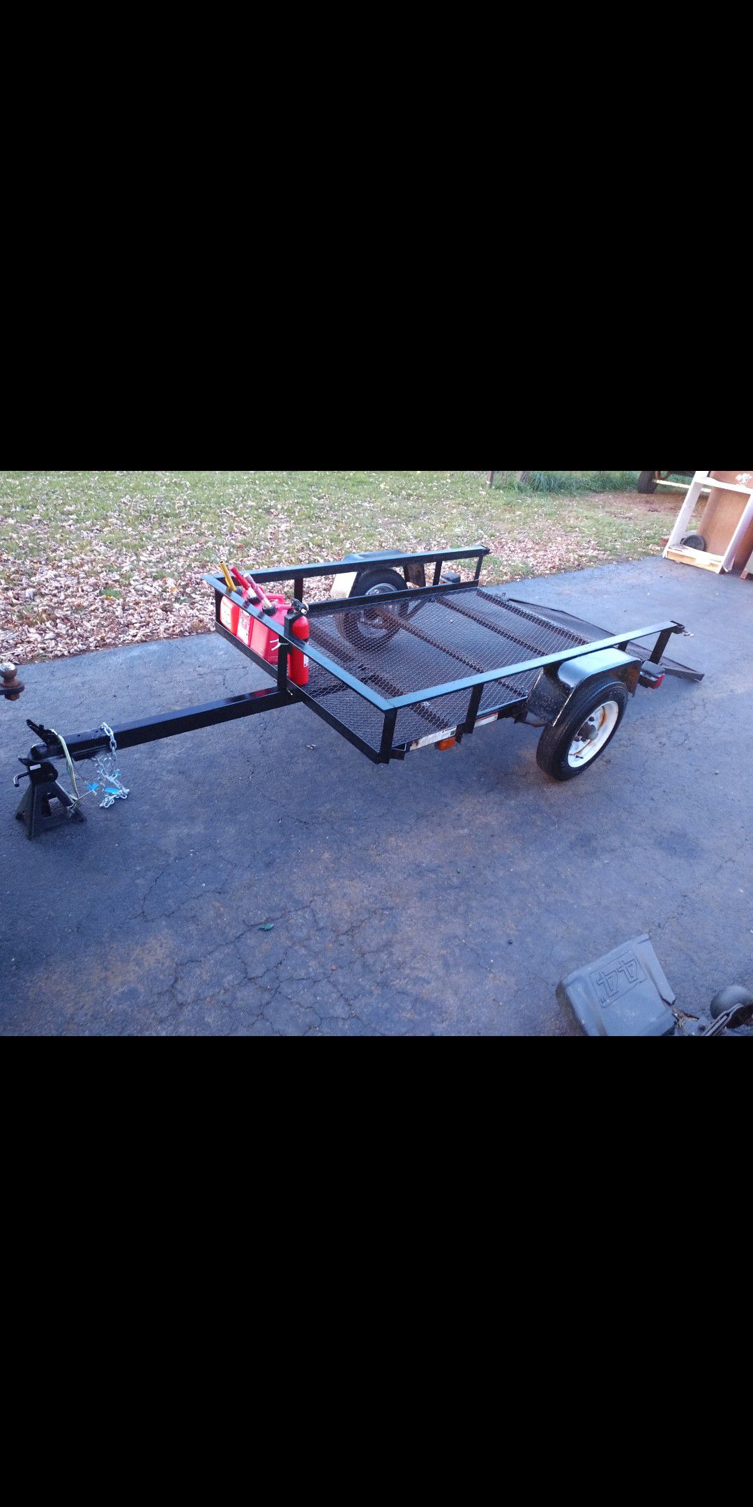 1700 lbs capacityTrailer with drop gate/ramp. Clean title.