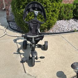Joovy Tricycoo 4.1 Kids Tricycle with 4-Stages Featuring Extra-Wide Front Tire, Removable and Adjustable Parent Handle, Safety Harness, Machine-Washab